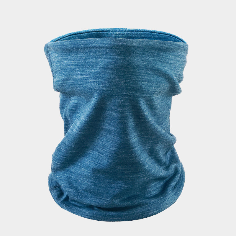 Child wearing a 150g lightweight Merino wool neck gaiter, soft and breathable fabric, providing warmth and comfort for outdoor activities in all seasons.