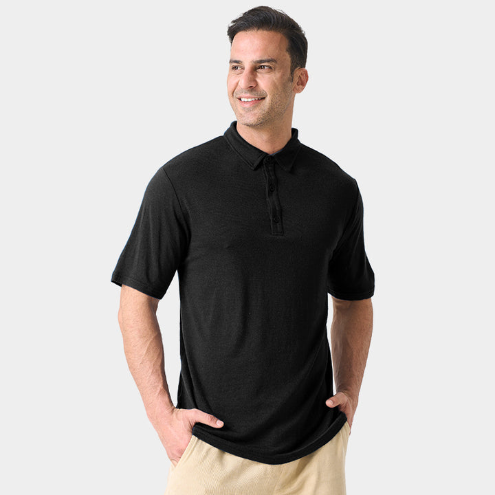 Male model wearing white merino wool polo shirt, featuring flexible fit, short sleeves, three-button placket, and stand-up collar for sun protection.
