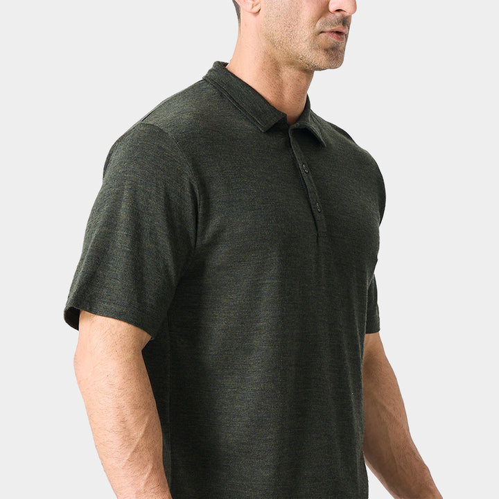 Male model wearing white merino wool polo shirt, featuring flexible fit, short sleeves, three-button placket, and stand-up collar for sun protection.
