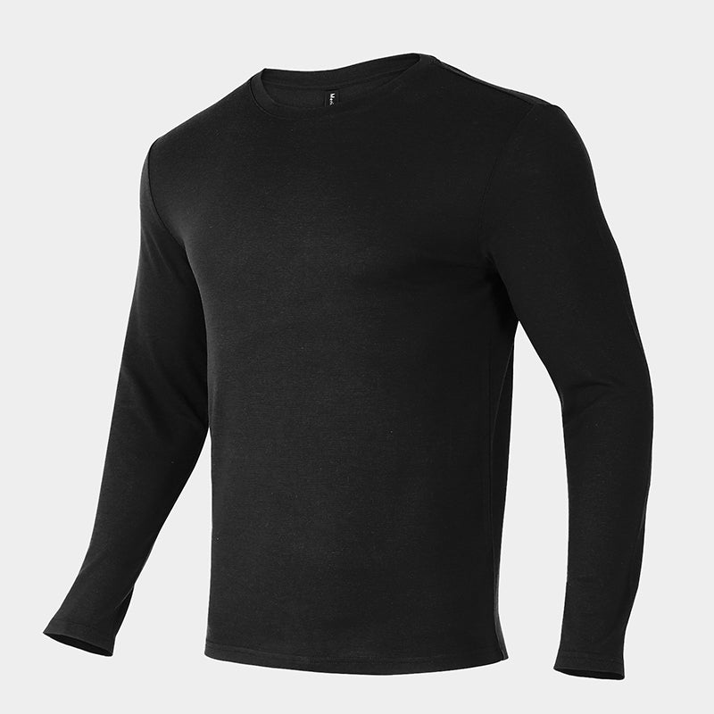 Male model wearing a lightweight Merino wool long sleeve crew base layer top, breathable and comfortable, shown in black.