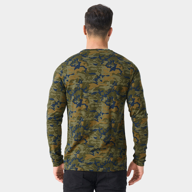 Male model wearing a lightweight Merino wool long sleeve crew base layer top, breathable and comfortable, shown in Camo.