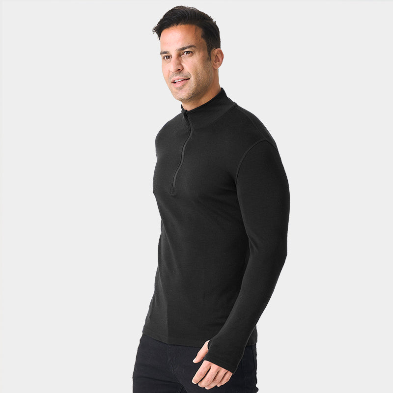Male model wearing black Men’s 250g Merino wool long sleeve half zip top, breathable and moisture-wicking for warmth and outdoor comfort.