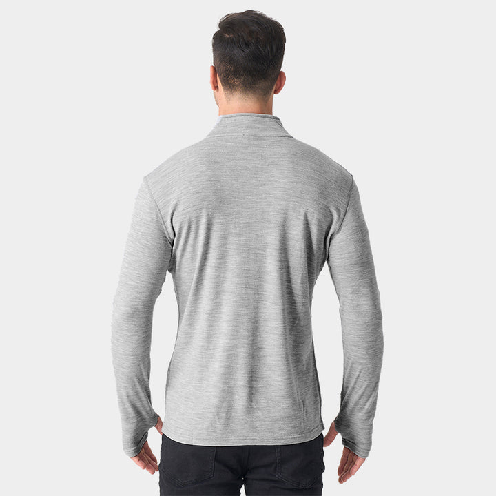 Male model wearing Light Grey Heather Men’s 250g Merino wool long sleeve half zip top, breathable and moisture-wicking for warmth and outdoor comfort.