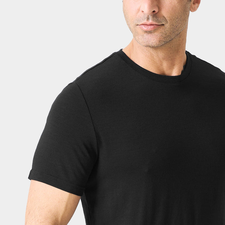 Midweight 100% Merino wool tee designed for year-round outdoor adventures, offering natural moisture-wicking, odor resistance, and breathable comfort.