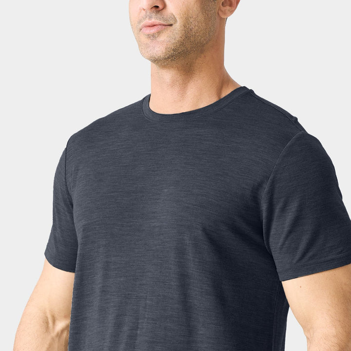 Midweight 100% Merino wool tee designed for year-round outdoor adventures, offering natural moisture-wicking, odor resistance, and breathable comfort.