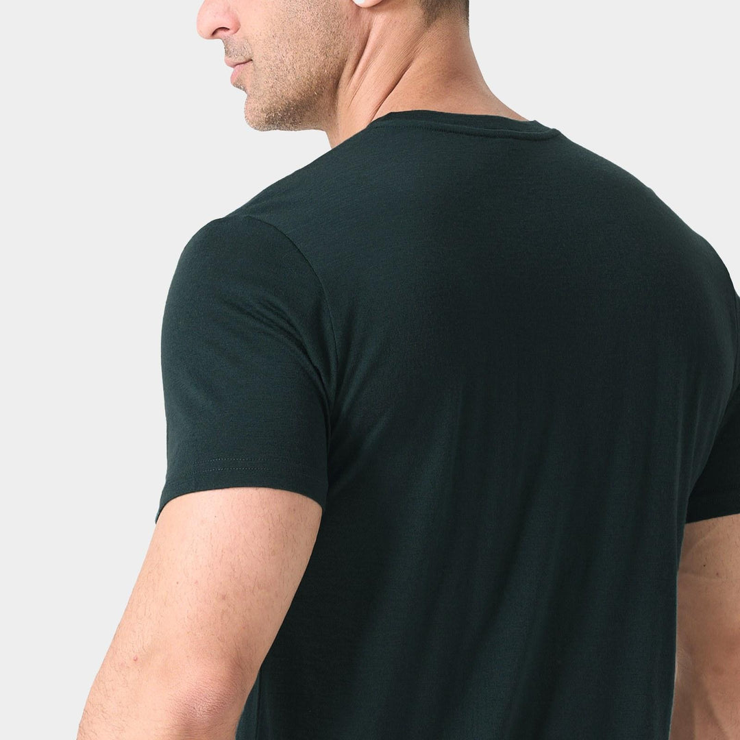 Midweight 100% Merino wool tee designed for year-round outdoor adventures, offering natural moisture-wicking, odor resistance, and breathable comfort.