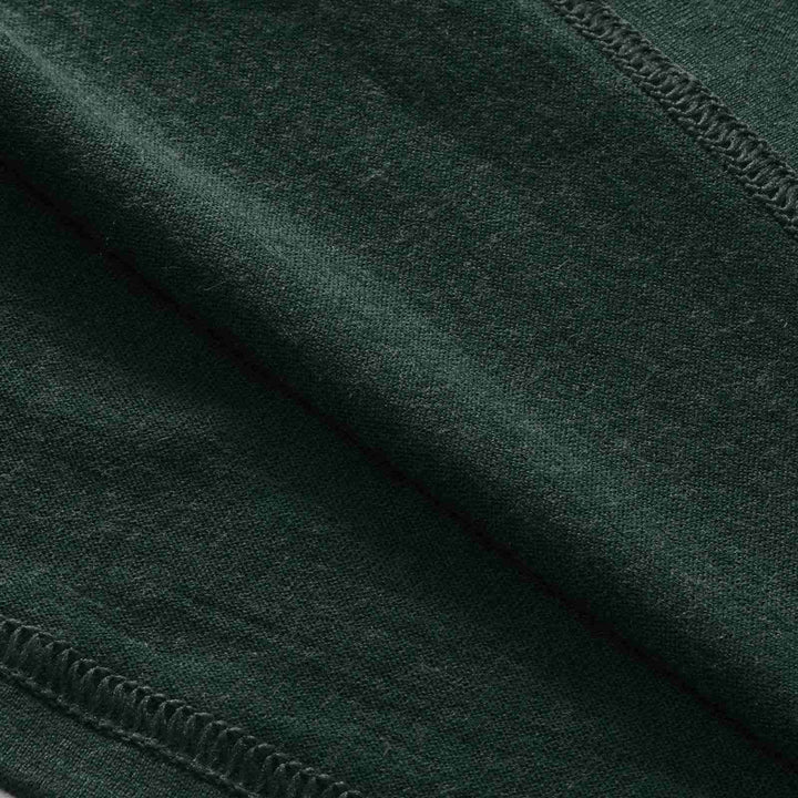 Midweight 100% Merino wool tee designed for year-round outdoor adventures, offering natural moisture-wicking, odor resistance, and breathable comfort.
