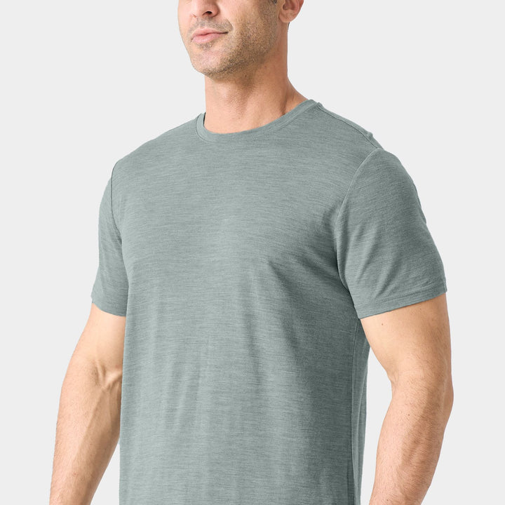 Midweight 100% Merino wool tee designed for year-round outdoor adventures, offering natural moisture-wicking, odor resistance, and breathable comfort.