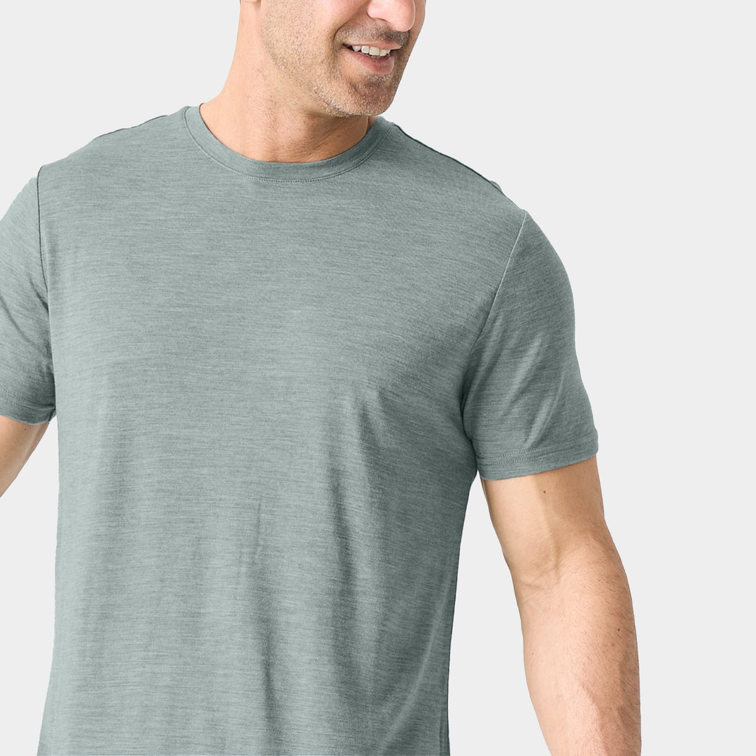 Midweight 100% Merino wool tee designed for year-round outdoor adventures, offering natural moisture-wicking, odor resistance, and breathable comfort.