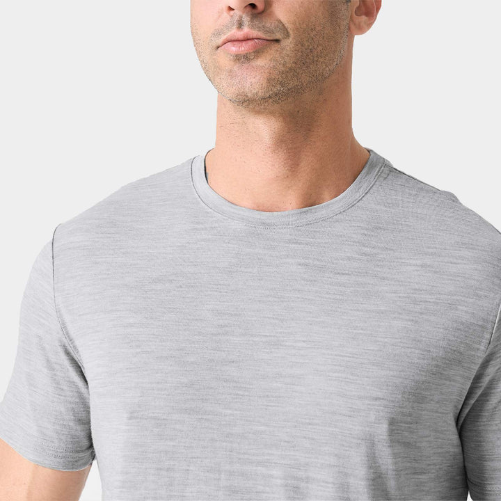 Midweight 100% Merino wool tee designed for year-round outdoor adventures, offering natural moisture-wicking, odor resistance, and breathable comfort.