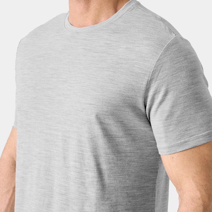 Midweight 100% Merino wool tee designed for year-round outdoor adventures, offering natural moisture-wicking, odor resistance, and breathable comfort.