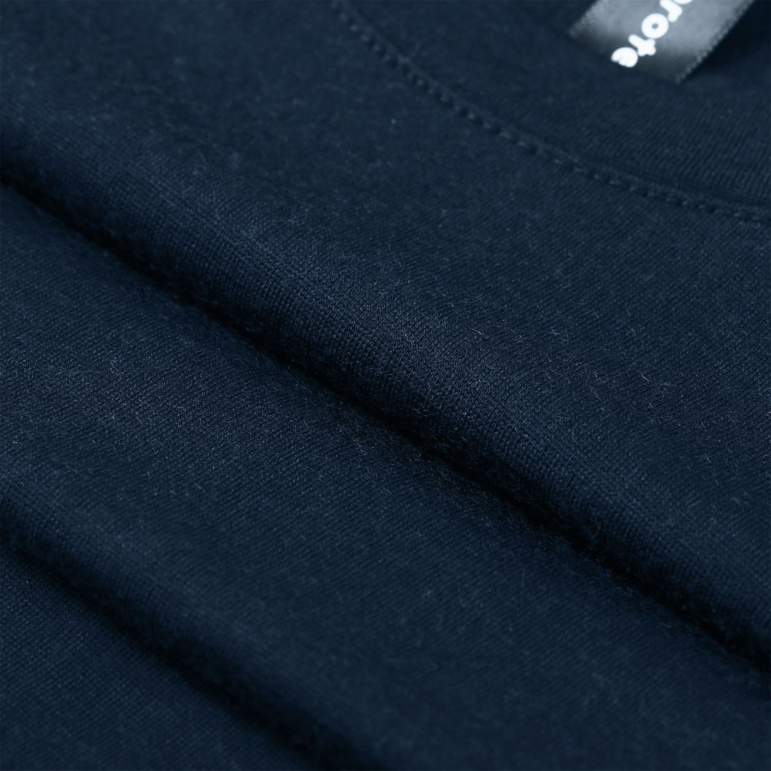 Midweight 100% Merino wool tee designed for year-round outdoor adventures, offering natural moisture-wicking, odor resistance, and breathable comfort.