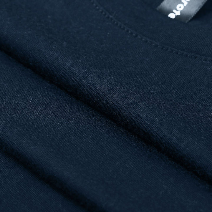 Midweight 100% Merino wool tee designed for year-round outdoor adventures, offering natural moisture-wicking, odor resistance, and breathable comfort.