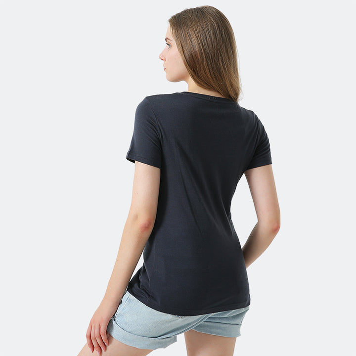 Famel model wearing a lightweight Merino wool short sleeve crew t-shirt, breathable and comfortable, shown in charcoal.