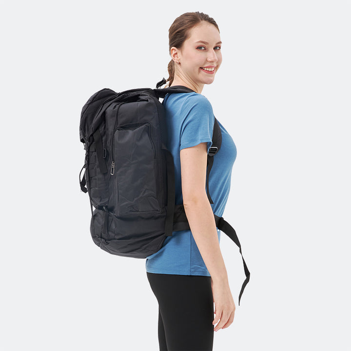 Famel model wearing a lightweight Merino wool short sleeve v-neck t-shirt, breathable and comfortable, shown in Lake blue.