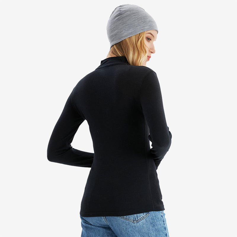Famel  model wearing black Men’s 250g Merino wool long sleeve half zip top, breathable and moisture-wicking for warmth and outdoor comfort.