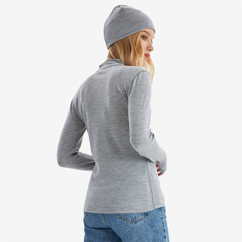 Famel  model wearing Light Grey Heather Men’s 250g Merino wool long sleeve half zip top, breathable and moisture-wicking for warmth and outdoor comfort.