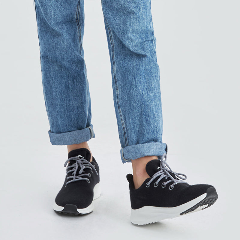 Dark grey women’s lace up shoes made with breathable Merino wool, lightweight and comfortable for everyday wear.