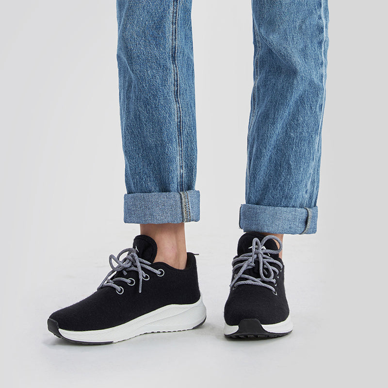 Dark grey women’s lace up shoes made with breathable Merino wool, lightweight and comfortable for everyday wear.