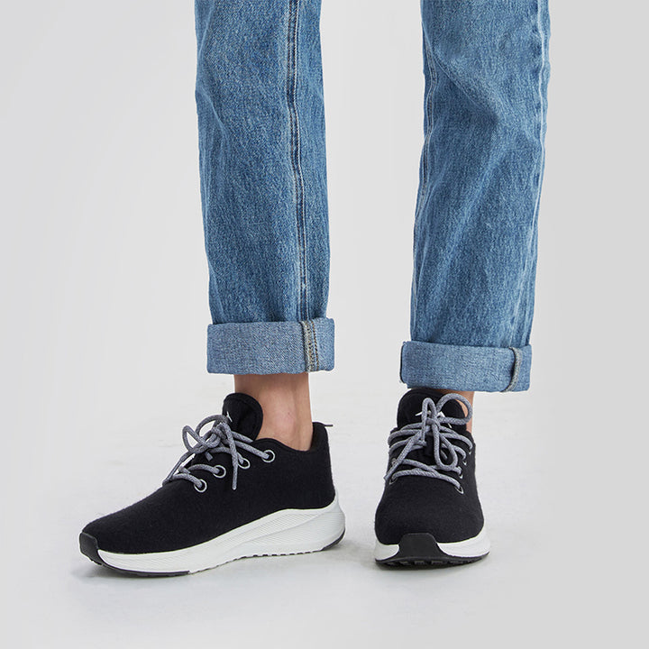 Dark grey women’s lace up shoes made with breathable Merino wool, lightweight and comfortable for everyday wear.