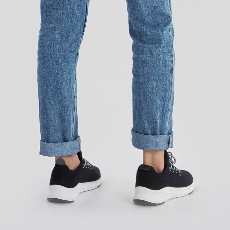 Dark grey women’s lace up shoes made with breathable Merino wool, lightweight and comfortable for everyday wear.